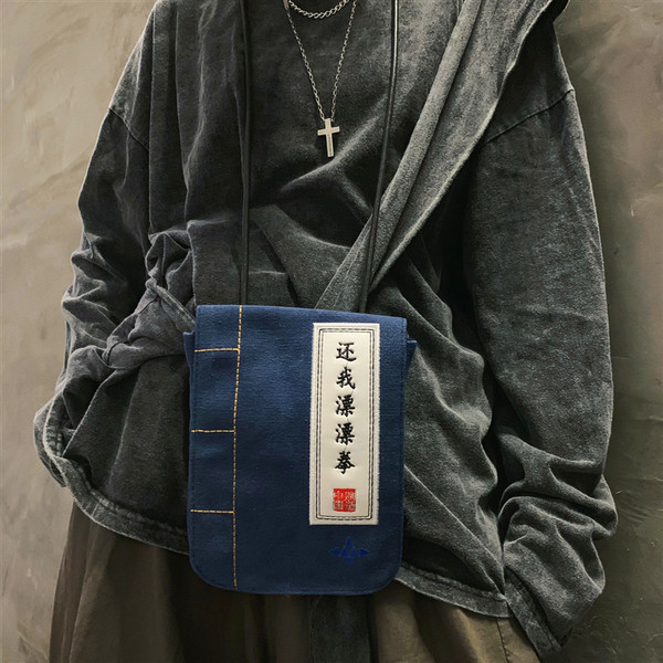 Meeste kandiline tekstiilist kott kirjaga