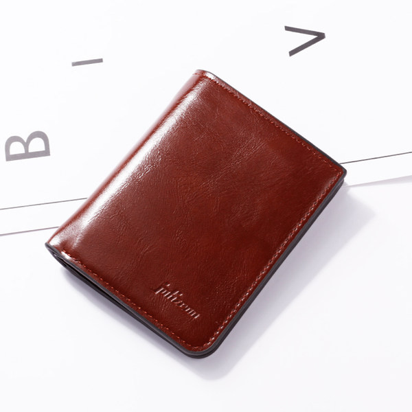 Mazs ādas maciņš ar pogas aizdari