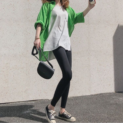 Sieviešu elastīgi legingi pelēkā un melnā krāsā