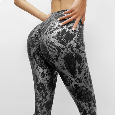 Naiste kõrge vöökoha ja loomatrükiga retuusid