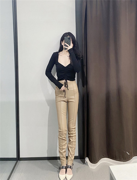 Moderni sieviešu legingi ar augstu vidukli no eko ādas