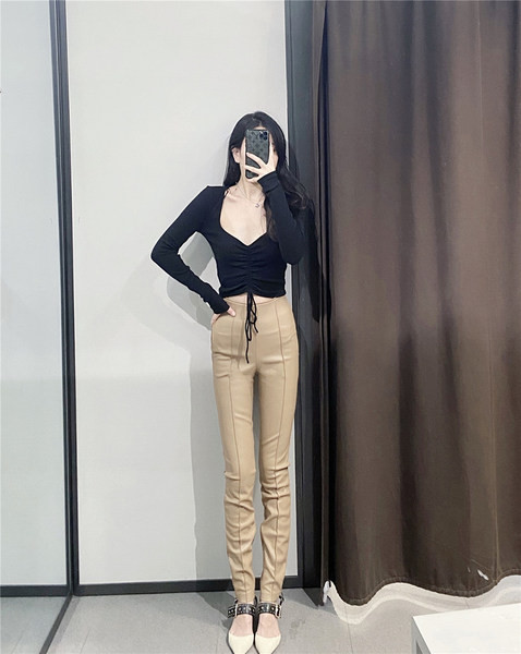 Moderni sieviešu legingi ar augstu vidukli no eko ādas