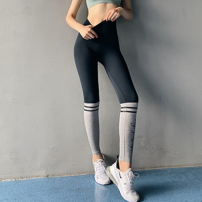 Kiiresti kuivavast kangast uue mudeli sportlikud naiste retuusid