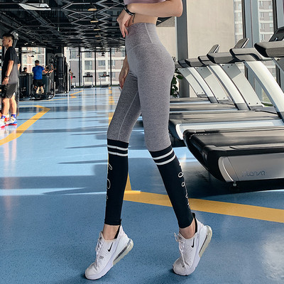 Kiiresti kuivavast kangast uue mudeli sportlikud naiste retuusid