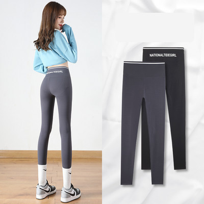 Sieviešu sporta legingi ar augstu vidukli vairākās krāsās ar uzrakstu