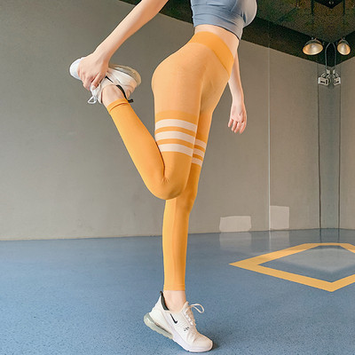 Sieviešu elastīgie legingi ar augstu vidukli, kas piemēroti sportam