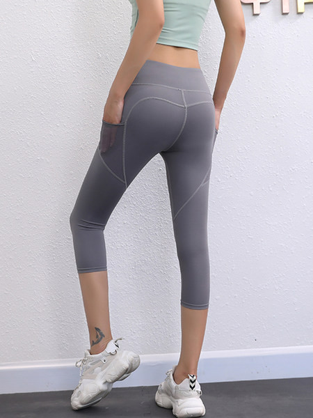 Sieviešu ķīļveida modelis ar augstu vidukli un 7/8 garumu