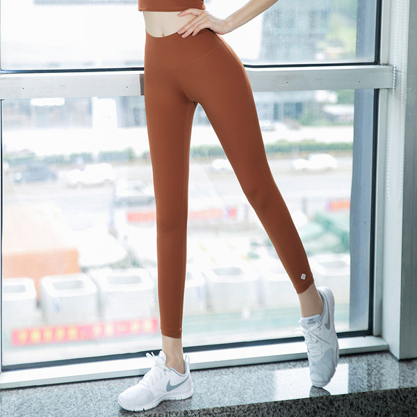 Vienkrāsaini sieviešu sporta legingi ar augstu vidukli