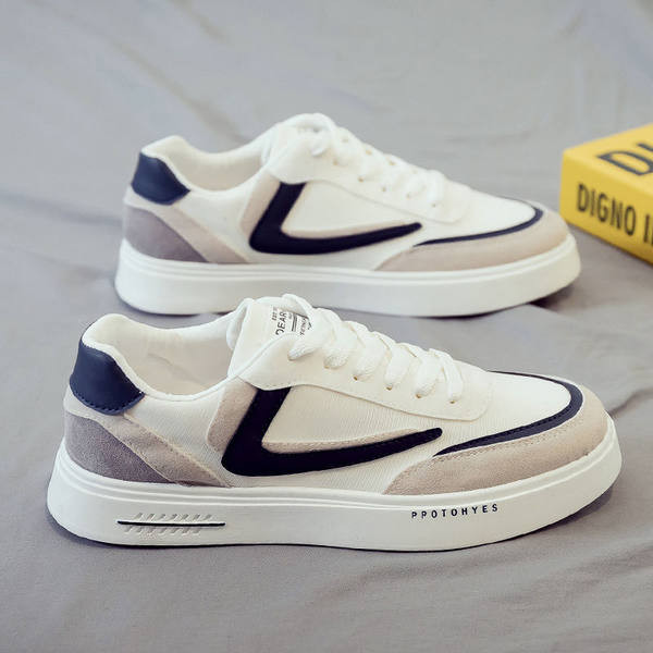 Igapäevaseks kasutamiseks sobivad lameda talla ja kirjaga meeste tossud