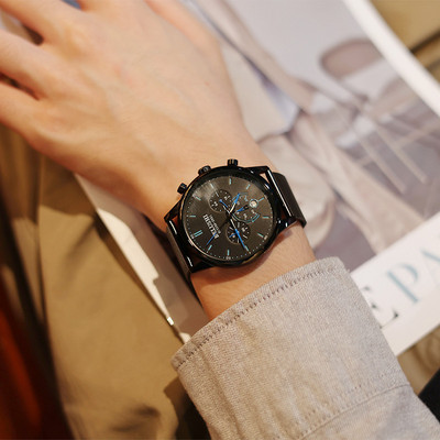 Vīriešu pulkstenis ar krāsainiem rādītājiem - apaļa forma