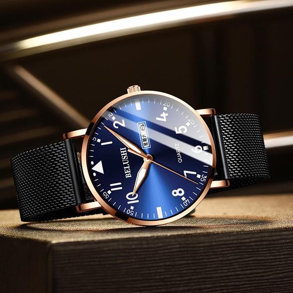 Napi férfi karóra fluoreszkáló mutatókkal