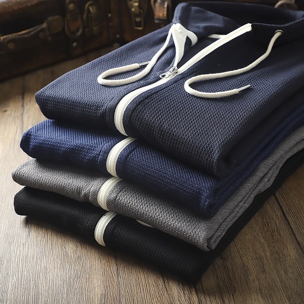 Taskute ja kapuutsiga vabaaja meeste dressipluus