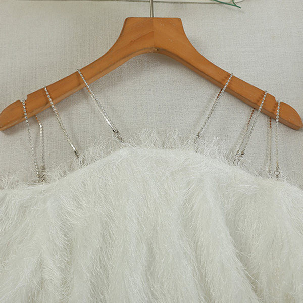 Aktuális női ruha bojttal és hosszú ujjal