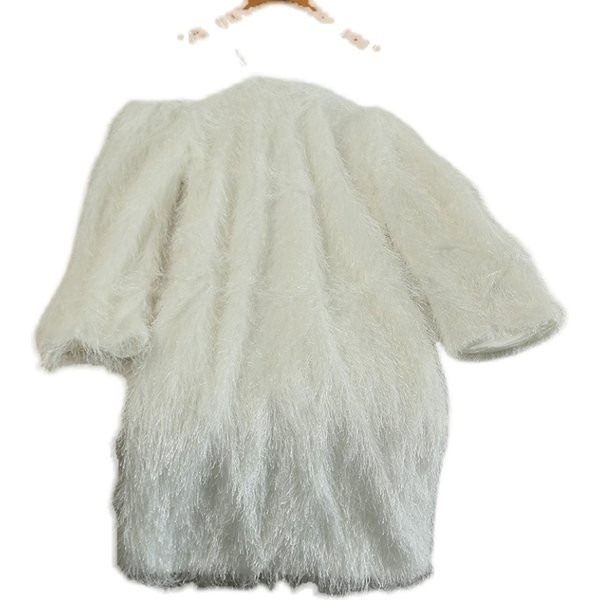 Aktuális női ruha bojttal és hosszú ujjal