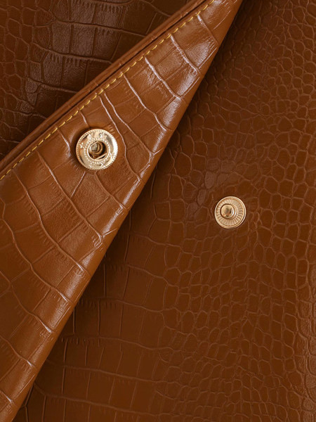 Rövid műbőr szoknya, kétsoros rögzítéssel