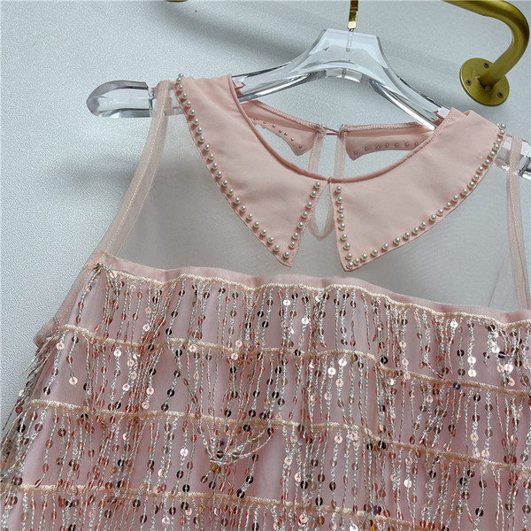 Új modell női ruha kerek nyakkivágással, flitterekkel