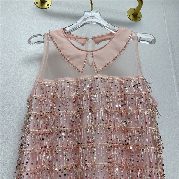 Új modell női ruha kerek nyakkivágással, flitterekkel