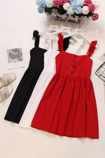 Új modell női ruha gombokkal és pántokkal