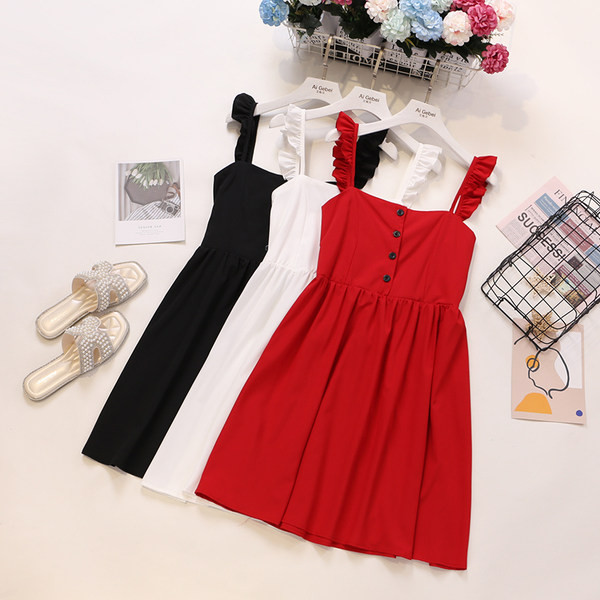 Új modell női ruha gombokkal és pántokkal