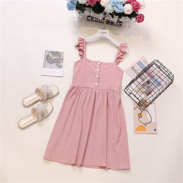 Új modell női ruha gombokkal és pántokkal