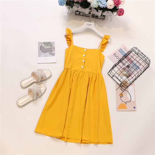 Új modell női ruha gombokkal és pántokkal