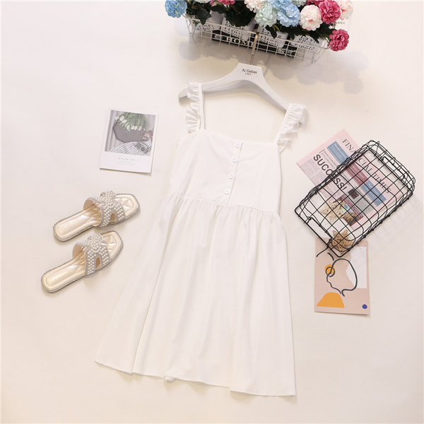 Új modell női ruha gombokkal és pántokkal