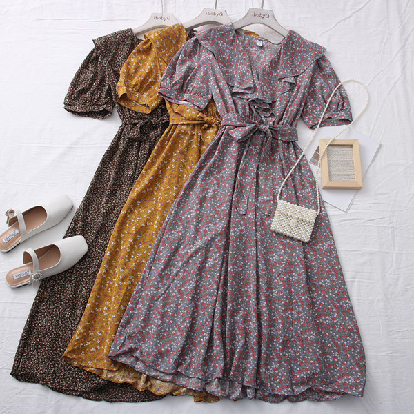 Tavaszi-nyári női ruha spitz nyakkivágással és övvel