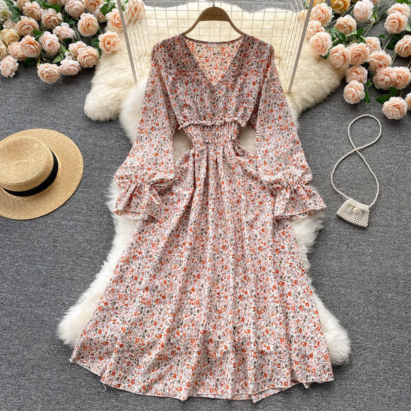 Dugačka ženska haljina sa cvjetnim uzorkom i elastičnim strukom