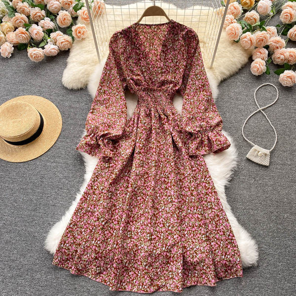 Dugačka ženska haljina sa cvjetnim uzorkom i elastičnim strukom