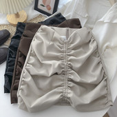 Ženska kožna suknja s patentnim zatvaračem i visokim strukom