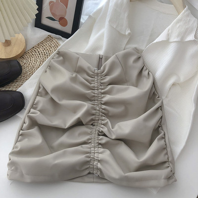 Ženska kožna suknja s patentnim zatvaračem i visokim strukom