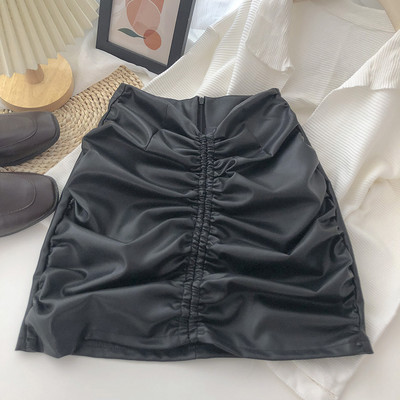 Ženska kožna suknja s patentnim zatvaračem i visokim strukom