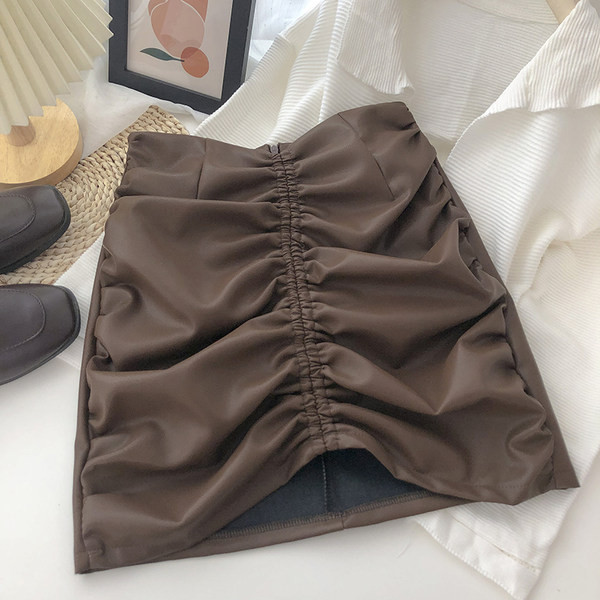 Ženska kožna suknja s patentnim zatvaračem i visokim strukom