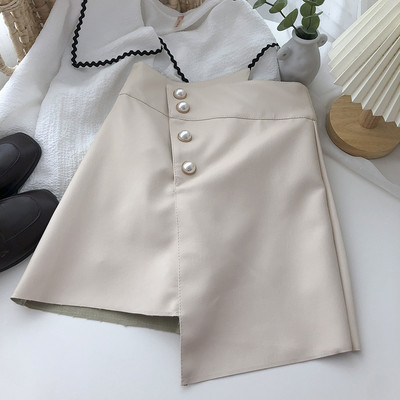 Έκο δερμάτινη ασύμμετρη φούστα με κουμπιά