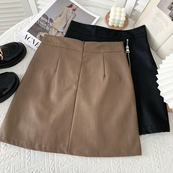 Naujo modelio rudens-žiemos moteriškas odinis sijonas su užtrauktuku