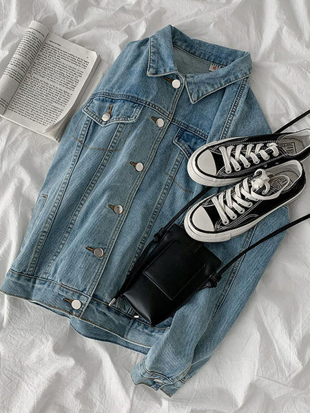 Uus mudel siniste taskutega teksajakk