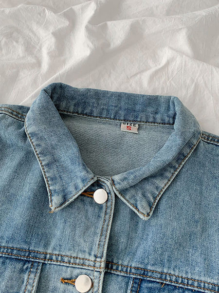 Uus mudel siniste taskutega teksajakk