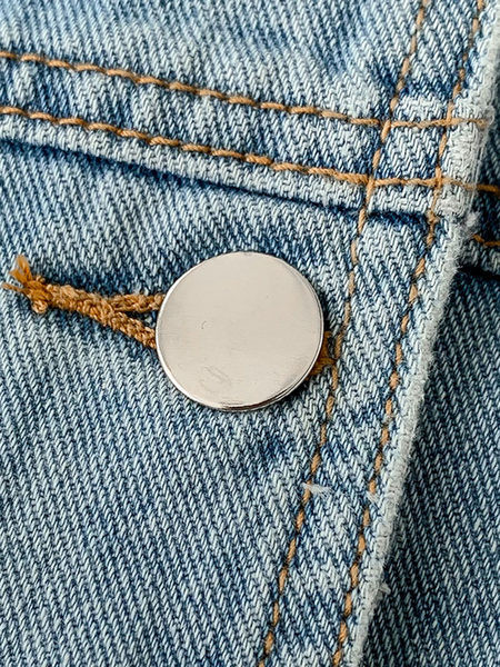 Uus mudel siniste taskutega teksajakk