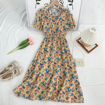 Uue mudeli lõikega naiste nööpidega kleit