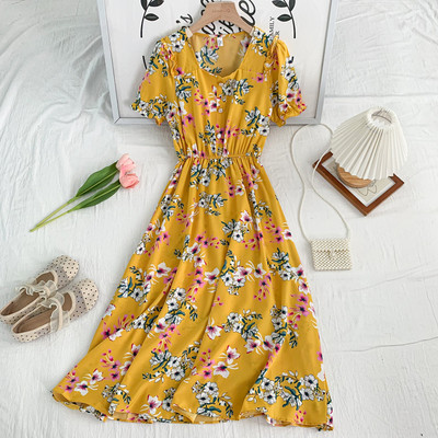 Uue mudeli lõikega naiste nööpidega kleit