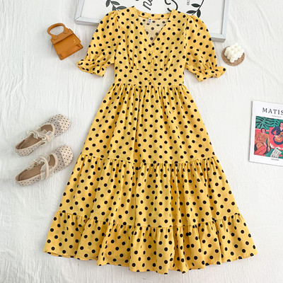 Γυναικείο πουά φόρεμα κομμένο με spitz λαιμόκοψη