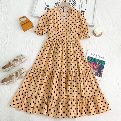 Γυναικείο πουά φόρεμα κομμένο με spitz λαιμόκοψη