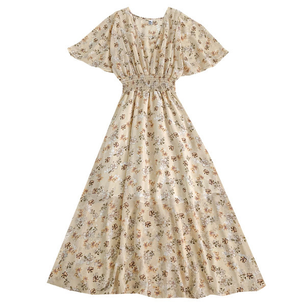 Moodne naistelõikeline spitsikaelusega ja lillemustriga kleit