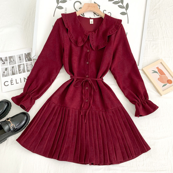 Új modell női ruha gombokkal és lótusz ujjú