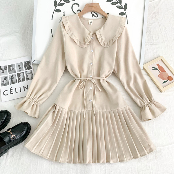 Új modell női ruha gombokkal és lótusz ujjú