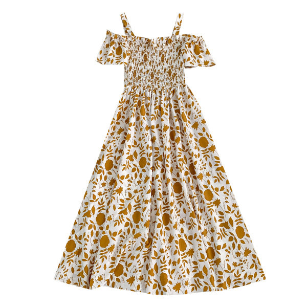 Új modell kivágott női ruha vékony pántokkal, virágmintával