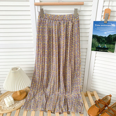 Πλισέ γυναικεία μακριά φούστα με λουλουδάτο μοτίβο