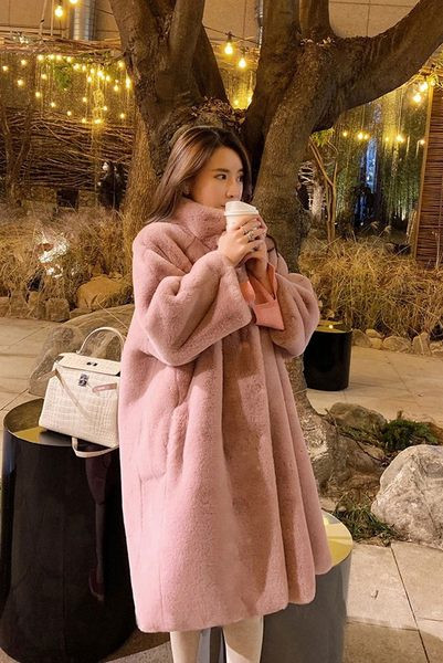 Naiste taskutega sulemantel