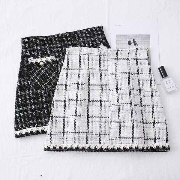 Kõrge vöökoha ja taskutega ruuduline naiste seelik