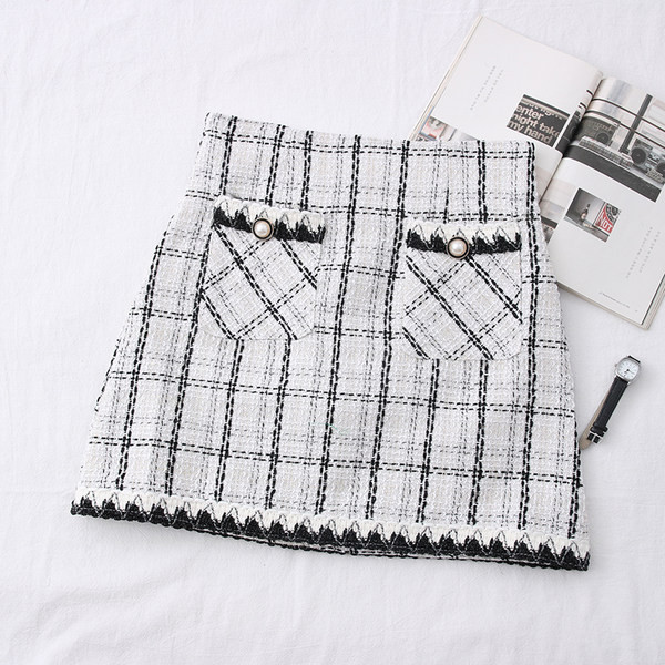 Kõrge vöökoha ja taskutega ruuduline naiste seelik